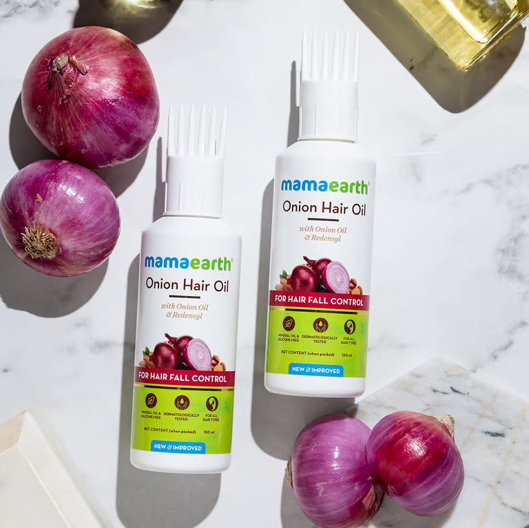 Mamaearth onion hair oil with onions 