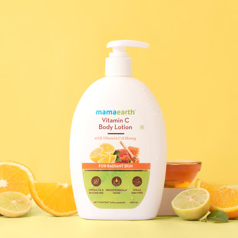 Mamaearth Vitamin C body lotion product pic with orange lemon background